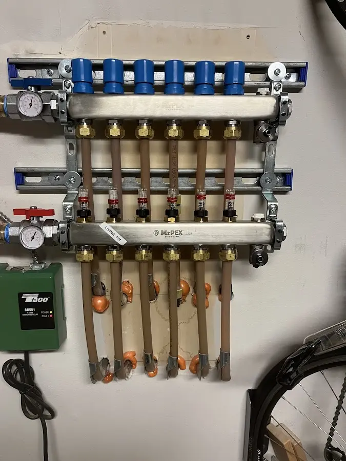 Plumber performing Gas Line Installation at a residential property in Collins